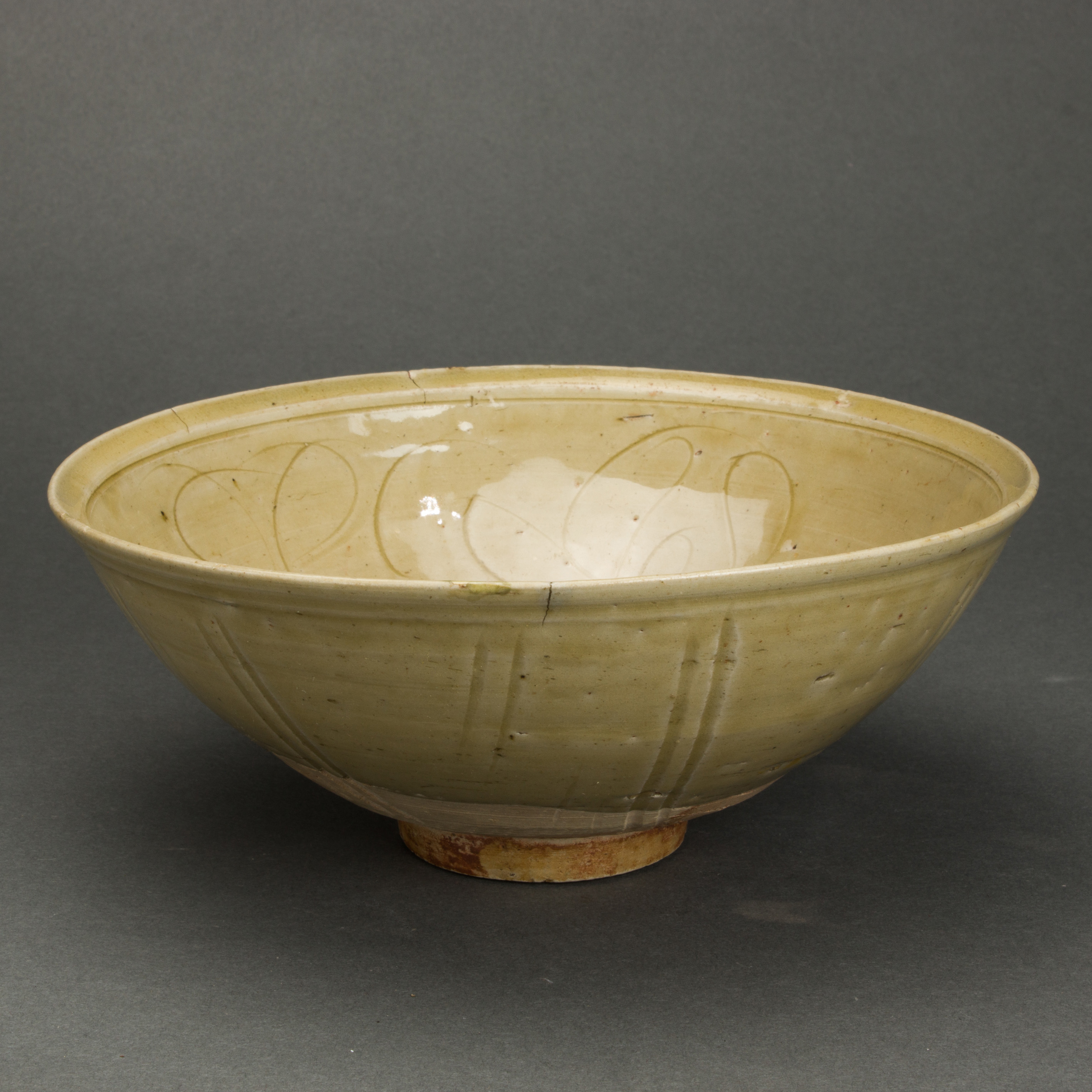 Appraisal: CHINESE YAOZHOU STYLE CELADON GLAZED BOWL Chinese Yaozhou style celadon