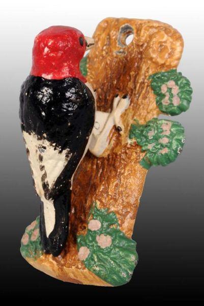 Appraisal: Cast Iron Woodpecker Doorknocker Description Made by Hubley and numbered