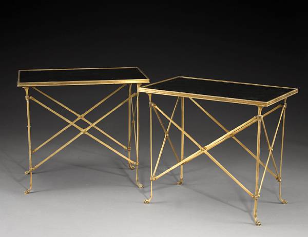 Appraisal: A pair of Directoire style gilt bronze and granite tables