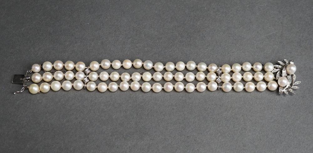 Appraisal: -KARAT WHITE-GOLD DIAMOND AND CULTURED PEARL TRIPLE STRAND BRACELET L