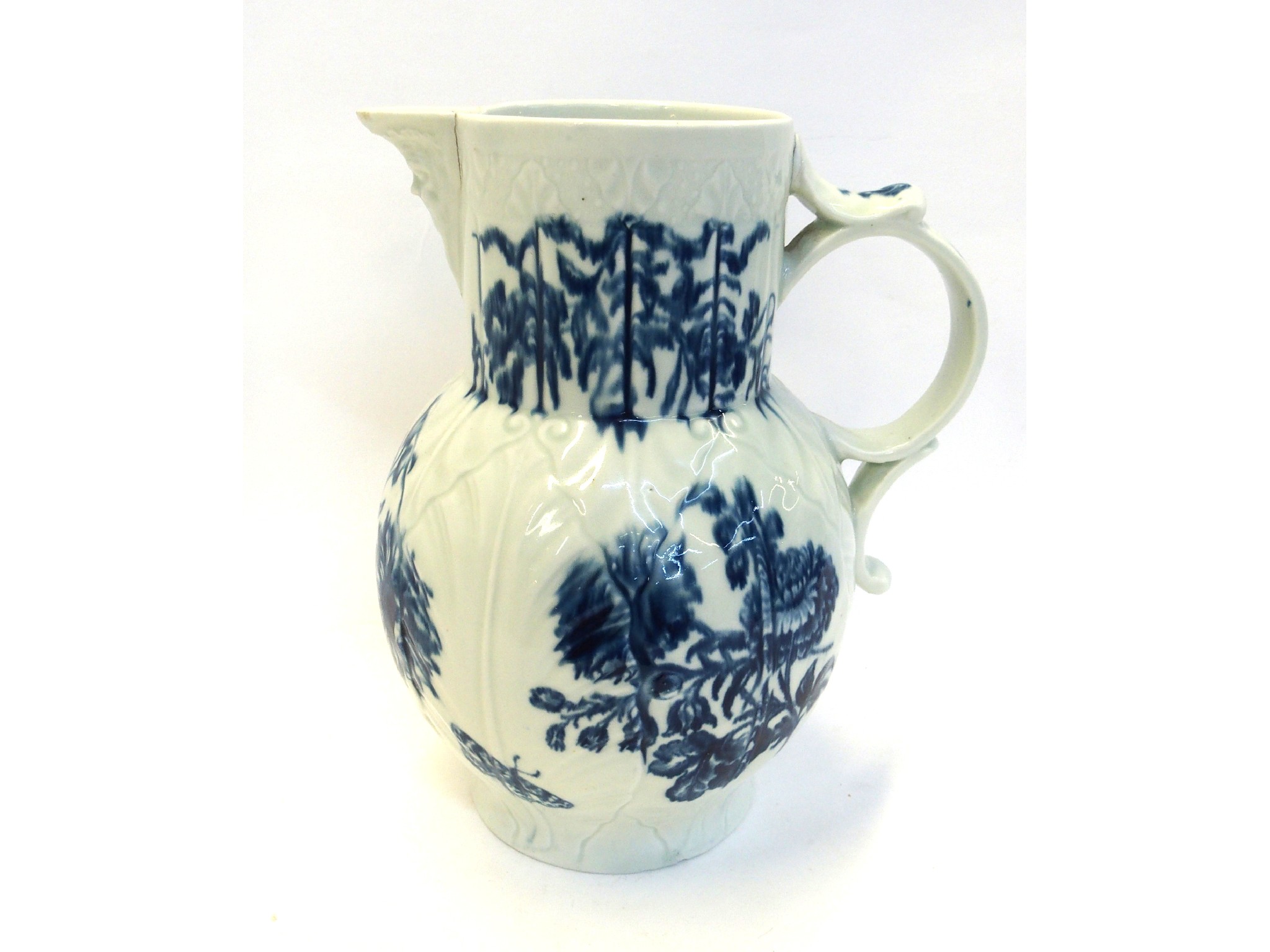 Appraisal: A Worcester cabbage leaf jug with blue and white decoration