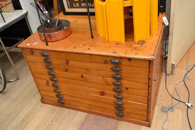 Appraisal: AN INDUSTRIAL KAURI PINE SPECIMEN CABINET OF NINE DRAWERS WITH