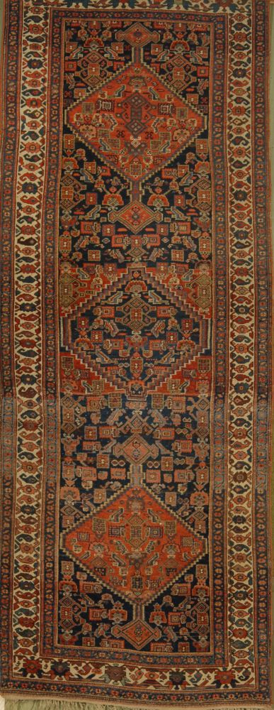 Appraisal: ORIENTAL RUG KURD BIDJAR ' x ' Three alternating red