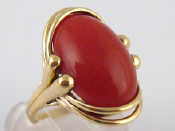 Appraisal: A yellow metal tests carat gold coral ring the coral