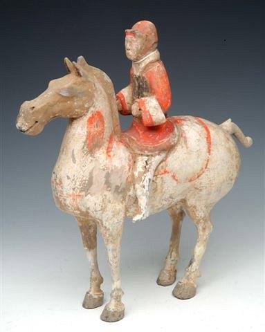 Appraisal: AN EARLY CHINESE POSSIBLY HAN DYNASTY HORSE AND RIDER with