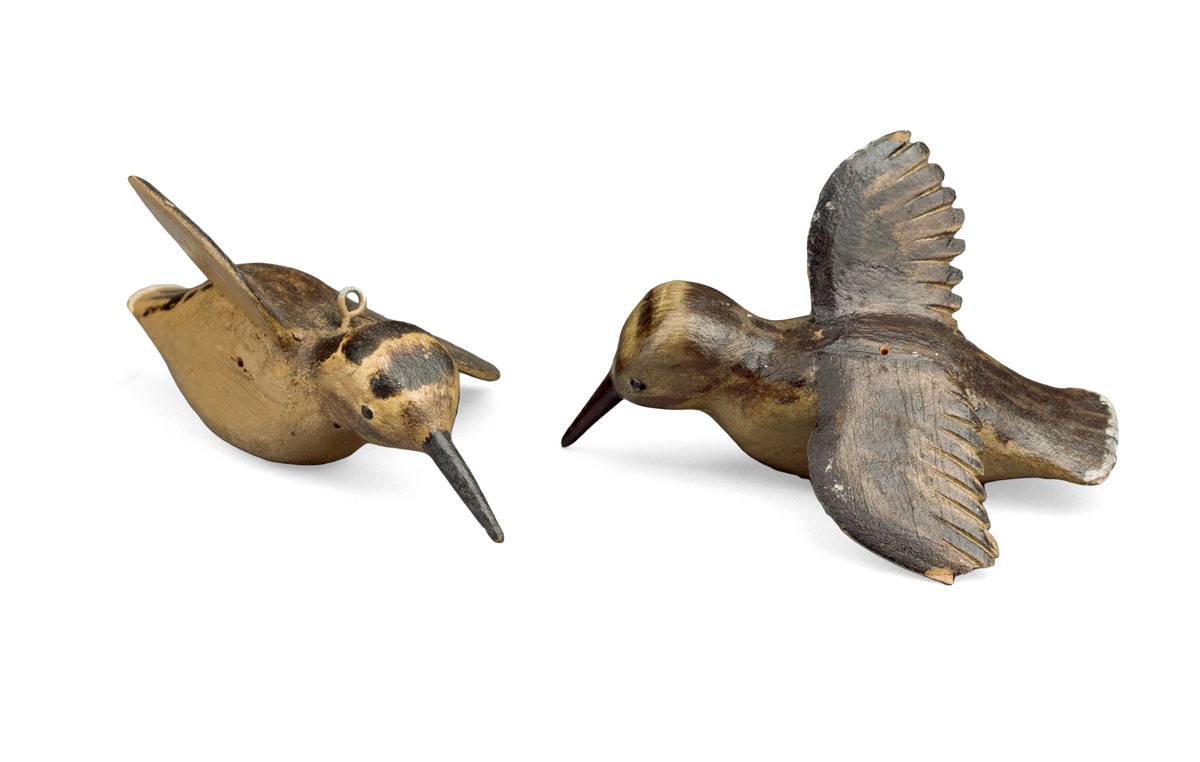 Appraisal: PAIR OF FOLK ART CARVED AND PAINTED WOODCOCK IN FLIGHT