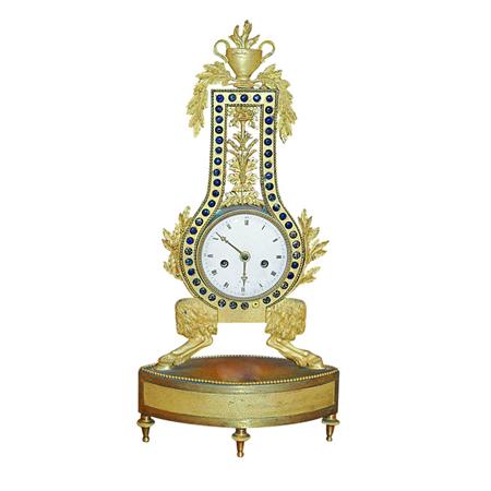 Appraisal: Neoclassical Style Gilt-Metal Lyre-Form Clock Estimate nbsp nbsp nbsp -