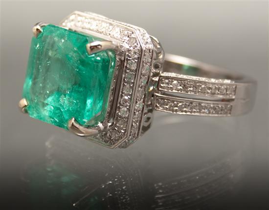 Appraisal: Lady's K white gold diamond and emerald cocktail ring center