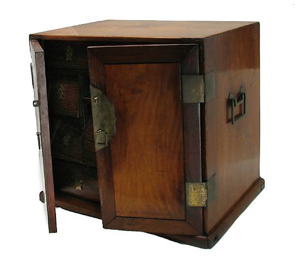 Appraisal: A Chinese hardwood small storage cabinet height in width in