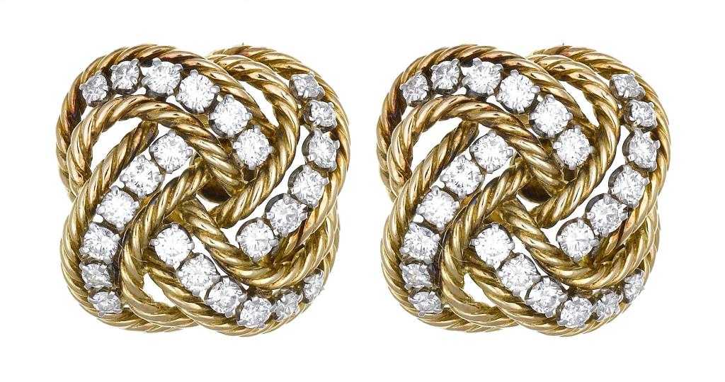 Appraisal: A PAIR OF BOUCHERON DIAMOND EARRINGS in the form of