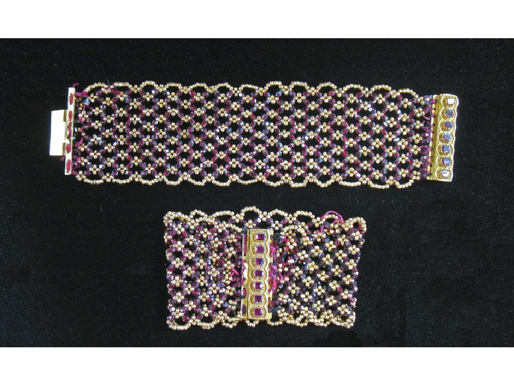 Appraisal: A PAIR OF EARLY TH CENTURY GARNET CUFF BRACELETS the