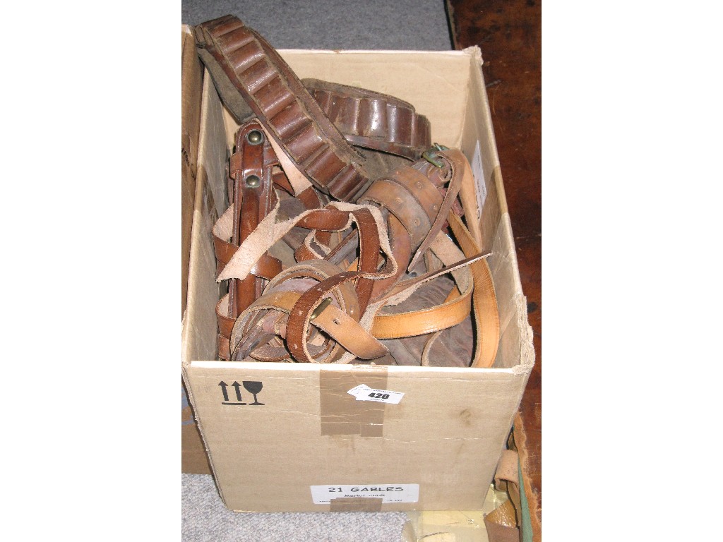 Appraisal: Lot comprising box of assorted cartridge belts and a gun