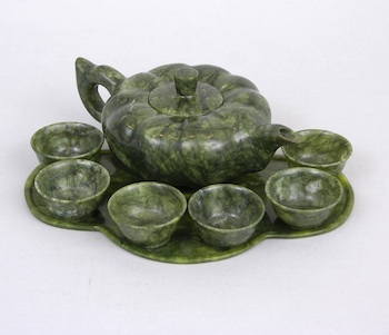 Appraisal: A Chinese Carved Jade Service The set includes a squash-form