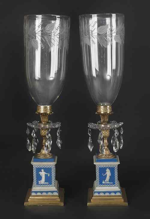 Appraisal: Pair of English candelabra ca with hurricane globes and blue