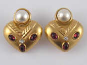 Appraisal: A pair of yellow metal tests carat gold garnet diamond