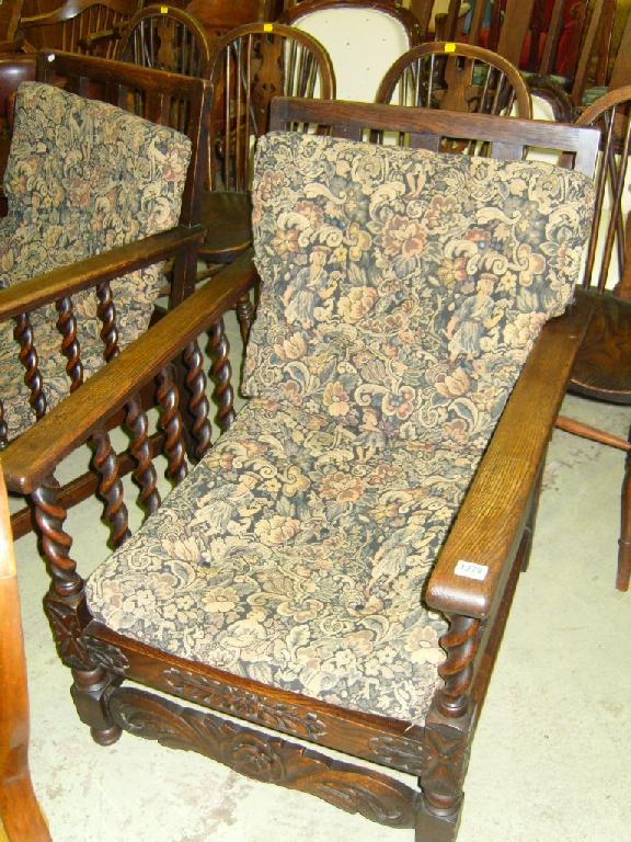 Appraisal: A pair of 's oak armchairs with tapestry seats within