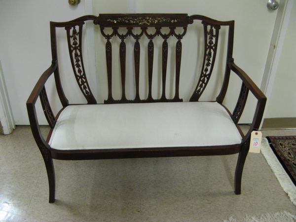 Appraisal: A CARVED AND INLAID MAHOGANY SETTEE American Sheraton Revival c