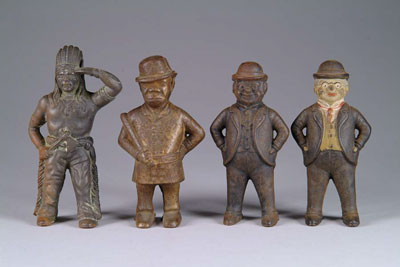 Appraisal: LOT OF CAST IRON STILL BANKS Standing policeman with club