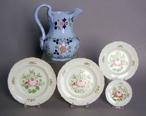 Appraisal: Four Queensware plates th c together with an English pitcher