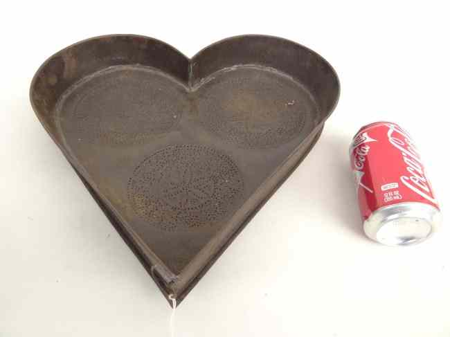 Appraisal: Heart shaped iron cheese drainer '' x ''