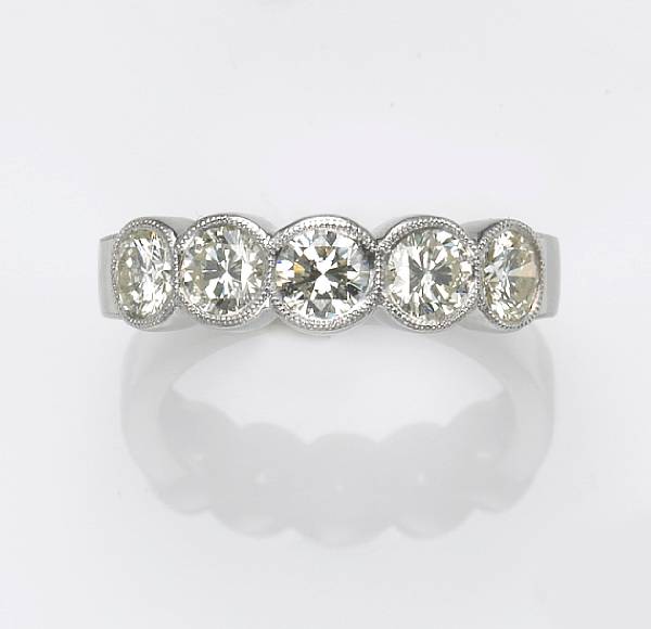 Appraisal: A diamond and platinum five stone ring estimated total diamond