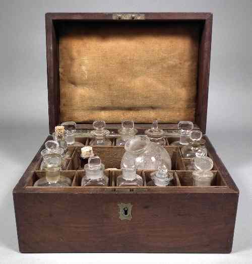 Appraisal: A late Georgian mahogany apothecary's box containing a selection of