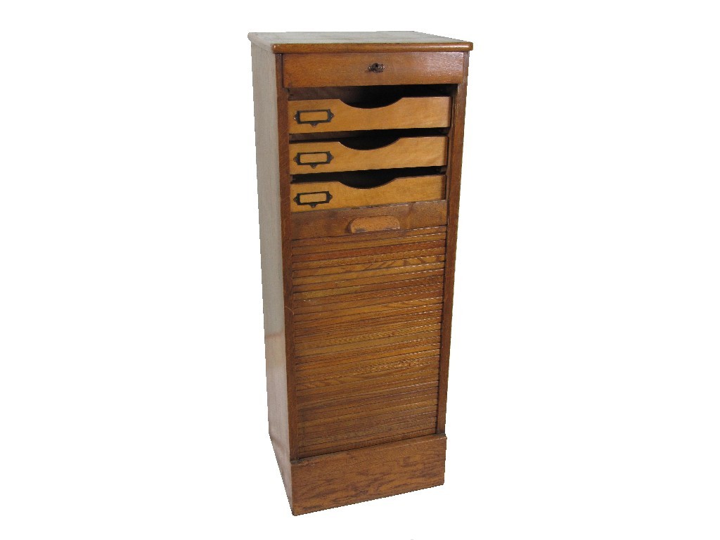 Appraisal: Oak filing cabinet with tambour shutter