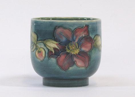 Appraisal: A MOORCROFT DEEP BOWL on pedestal foot the shaded blue