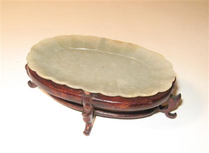 Appraisal: Chinese celadon jade dish on stand th century