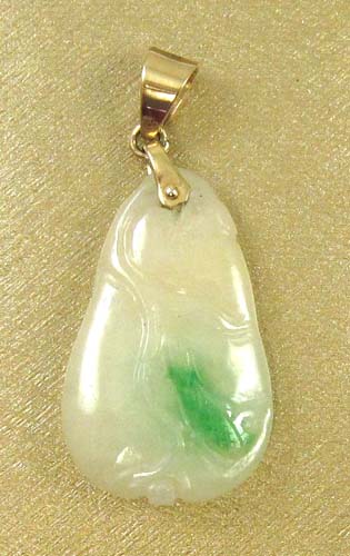 Appraisal: JADEITE JADE AND FOURTEEN KARAT GOLD PENDANT with Mason Kay