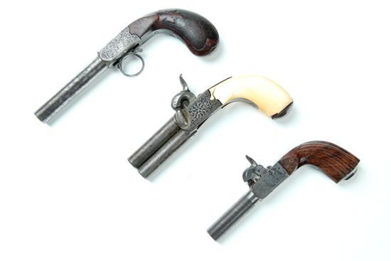 Appraisal: THREE ENGRAVED PERCUSSION PISTOLS Europe or England th Century Over