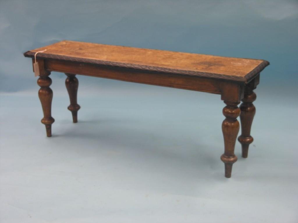 Appraisal: A Victorian mahogany hall bench on turned legs ft in