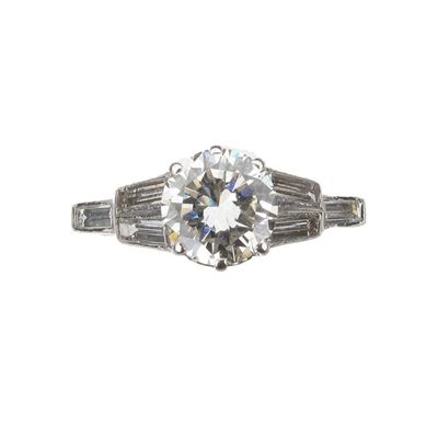 Appraisal: A diamond solitaire ring The circular cut diamond is set