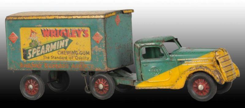 Appraisal: Pressed Steel Buddy L Wrigley Truck with Trailer Description Circa