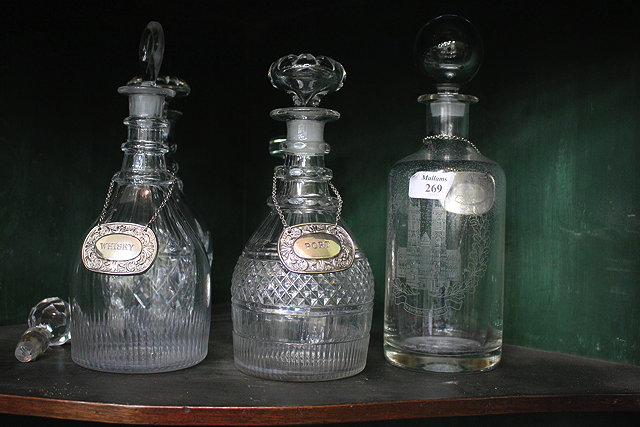 Appraisal: A COLLECTION OF CUT GLASS DECANTERS spirit labels and a