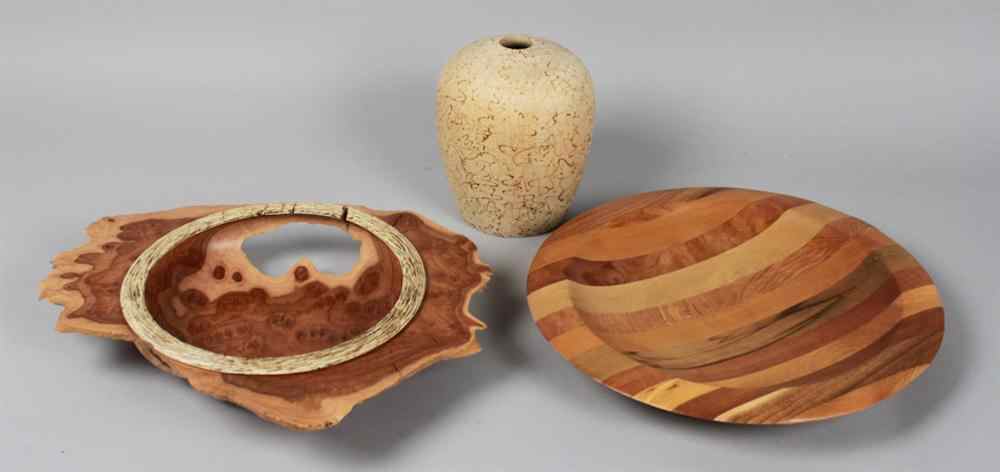 Appraisal: THREE HANDCRAFTED WOOD VESSELS Including an ovoid decorated vase a