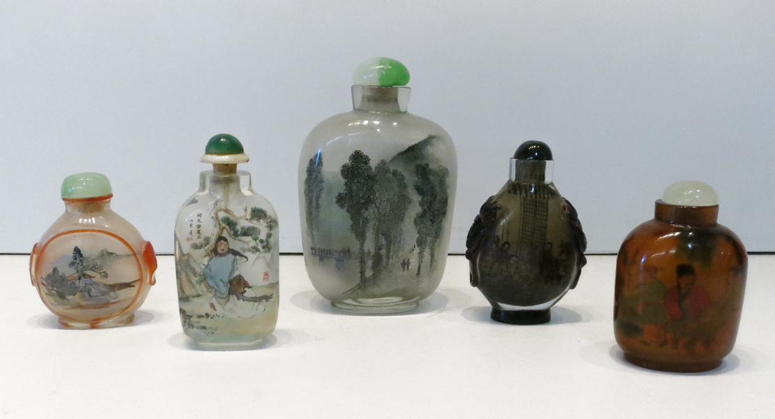 Appraisal: A GROUP OF FIVE CHINESE REVERSE-PAINED GLASS SNUFF BOTTLES -