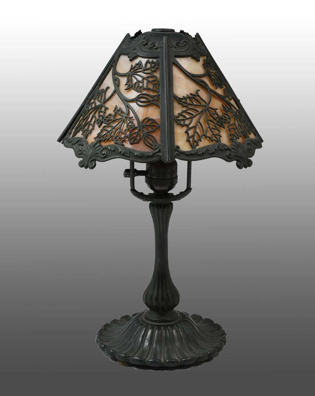 Appraisal: WILKINSON CO SLAG GLASS FILIGREE LAMP Patinated bronze single light