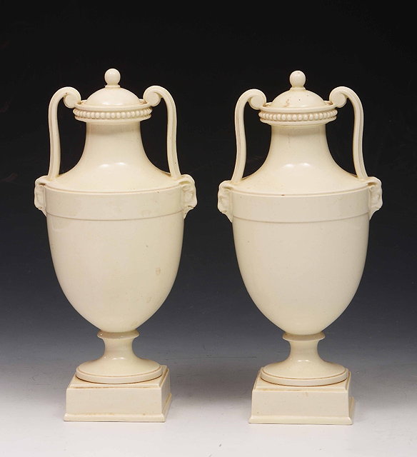 Appraisal: A pair of Wedgwood creamware two handled urnsof classical form