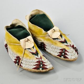 Appraisal: Apache Beaded Hide Moccasins c late th century hard soles