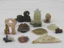 Appraisal: A quantity of about twelve hardstone bone and ivory artefacts