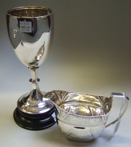 Appraisal: Silver comprising a milk jug with engraved decoration probably London