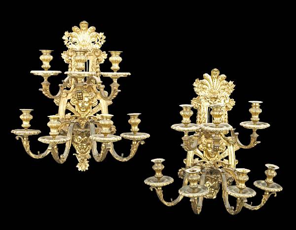 Appraisal: A pair of R gence style gilt bronze seven light