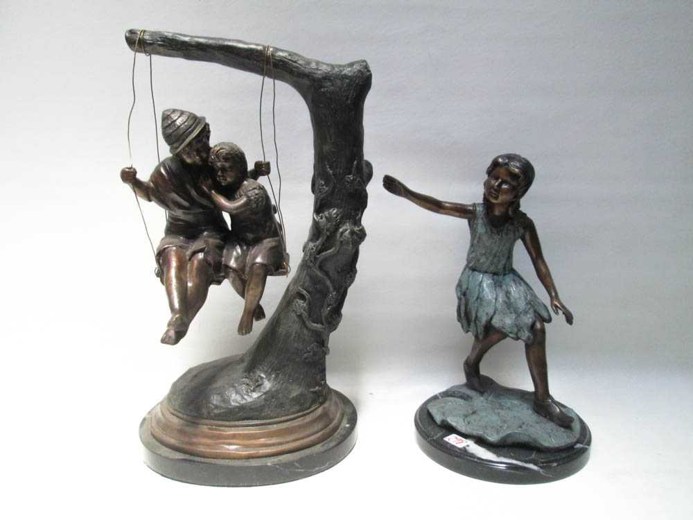 Appraisal: FOUR BRONZE FIGURAL SCULPTURES a young boy and girl on