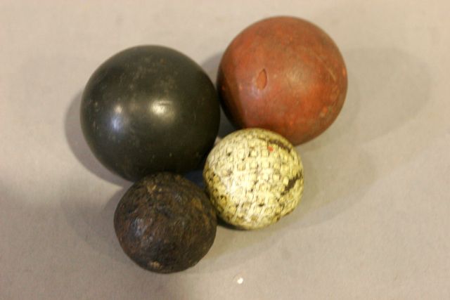 Appraisal: A vintage golf ball together with three other vintage balls