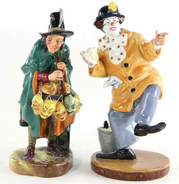 Appraisal: Two Royal Doulton Figuresthe first is the ''Mask Seller ''