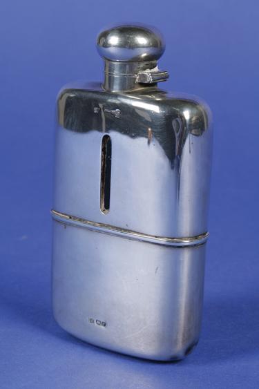 Appraisal: A GEORGE V HIP FLASK of conventional form with a