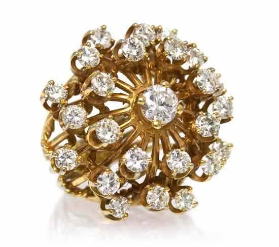 Appraisal: A Yellow Gold and Diamond Cluster Ring containing one round