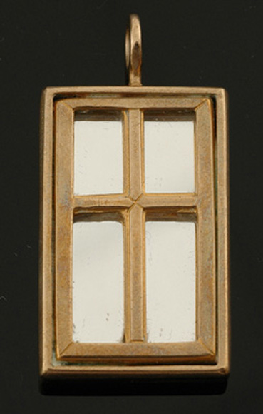 Appraisal: A mirrored silver gilt pendant Designed as a mirror backed