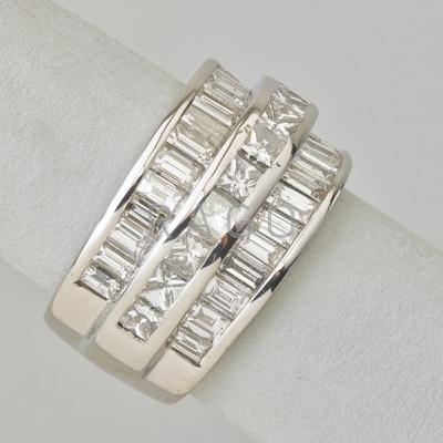 Appraisal: JACOB CO DIAMOND AND PLATINUM BAND Twelve princess cut diamonds